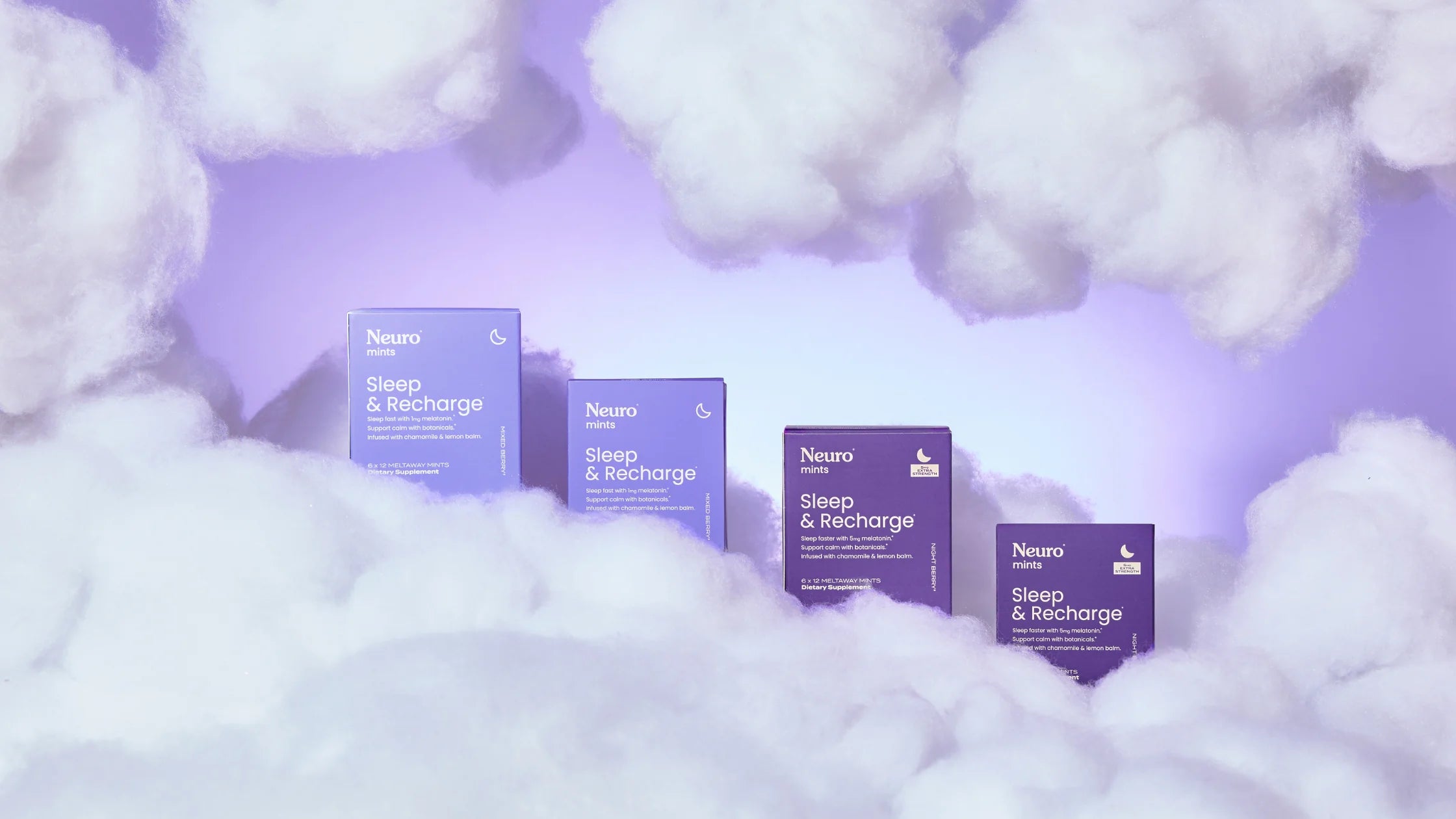 Four boxes of Sleep & Recharge mints floating among clouds, showcasing the product in a dreamy setting.